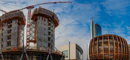 Milan Italy 4 December 2019: construction of a new library of trees in the island district. In the architectural redevelopment projectの写真素材