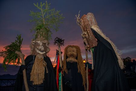 Dossena Bergamo Italy February 2 2020: Gathering of masks between comedy and carnival in an old villageのeditorial素材