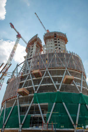 milan italy 8 eptember: safety on a mobile lifting platform in the construction of the tree library in Milanの写真素材