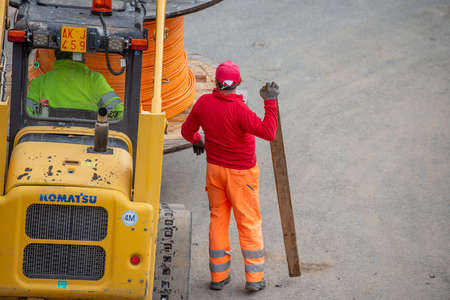 Zorzone Bergamo Italy 23 September 2020: Workers at work to bury the cables of the ultra-fast...