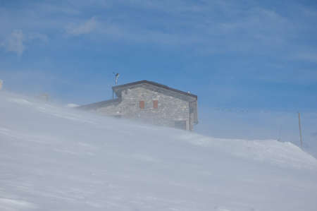 shelter with gusts of wind moving chaletの写真素材