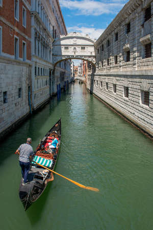 venice italy july 18 2020: Gondola with tourists at the bridge of sighs in veniceのeditorial素材