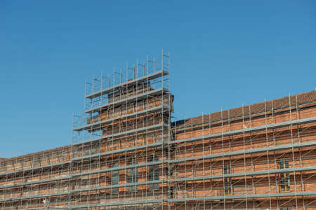 Security scaffolding for remodeling old buildingの写真素材