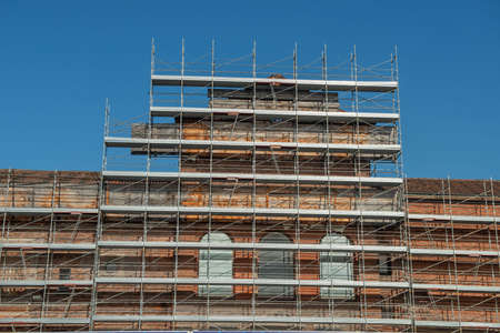 Security scaffolding for remodeling old buildingの写真素材
