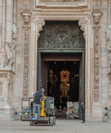 Milan Italy March 29 2021: Mobile platforms for maintenance and cleaning of the marble surfaces of the Milan Cathedralのeditorial素材