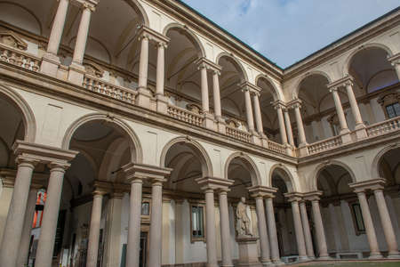 Milan Italy May 3 2021: interior of the Brera Fine Arts Academy in Milan with garden portico and statuesのeditorial素材