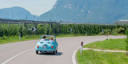 SchÃ¶fens Innsbruck Ãsterreich July 26, 2020: Journey on Austrian roads with an open vintage carのeditorial素材