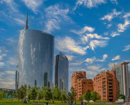 milan italy 4 may 2021: glass skyscrapers built in the park in milanの写真素材