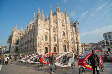 Milan Italy 9 September 2021: Ecological and sustainable transport for tourists with Rickshaws in the city center of Milanの写真素材