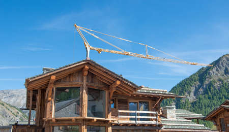 Livigno Italy September 28 2021: house construction with wooden thermal insulationの写真素材