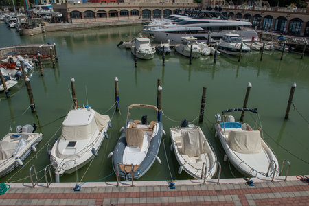Cattolica Italy 21 June 2022: Small boats docked in the port in Roman Emiliaのeditorial素材