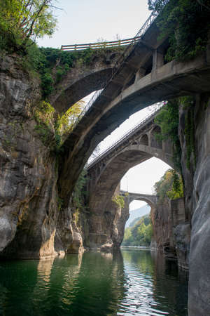 Crossing bridges over the riverの写真素材