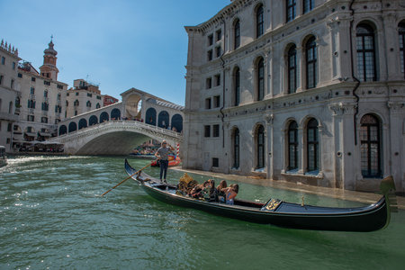 Venice Italy September 27 2022: Gondola that transports tourists on vacation in Veniceの写真素材