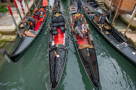 Venice Italy September 27 2022: Gondola that transports tourists on vacation in Veniceの写真素材