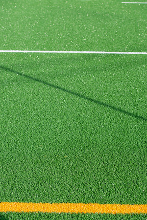 Laying of synthetic grass in a sports centerの写真素材