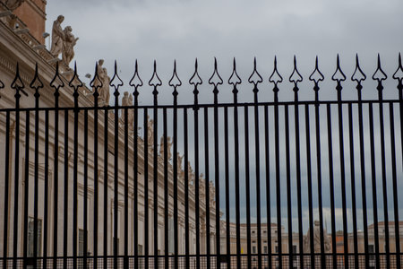 Wrought iron gate at St. Peter's square in Romeの写真素材