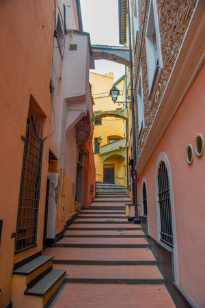 Alley of the old village of Loano in Liguriaの写真素材