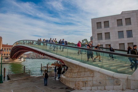 Venice Italy 9 October 2024: Pedestrian bridge crossing the Grand Canal of Venice between Piazzale Roma and the Venezia Santa Lucia train station.の写真素材