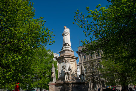 Milan Italy 7April 2025:Marble statue of Leonardo Da Vinci in the square in front of the Scala theatre in Milanの写真素材