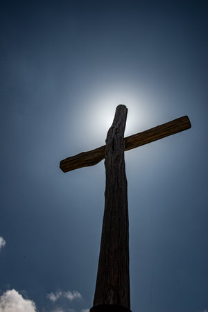 Wooden cross placed on the summit in memory of the fallen of the mountainの写真素材