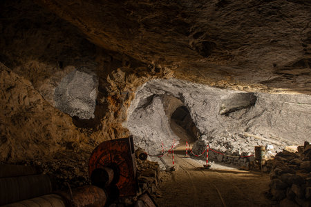 Dossena, Italy, July 12, 2025: Interior of the now-disused copper mine. It has become a site for...