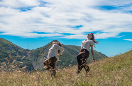 Beyond the hill Italy 26 July 2025: Dancers warming up their muscles before the musical show.