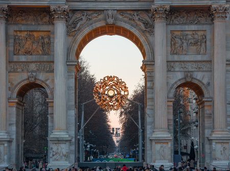 Milan, Italy, February 11, 2026: The Arco della Pace in Milan with the Olympic torch lit for the Milan-Cortina 2026 Winter Olympicsの写真素材