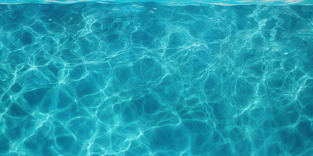 Blue rippled water surface in swimming pool. Summer background.の素材