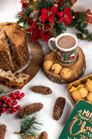 Christmas panettone and cup of hot chocolate with cookies on a white backgroundの写真素材