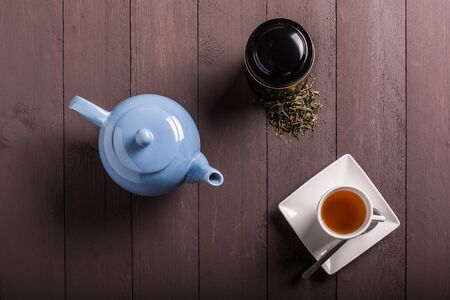 white tea cup on the woodの写真素材