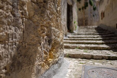 wall in matera with stairs in backgroundの写真素材