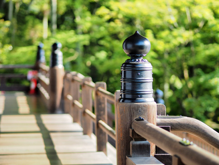 pillars in temple in sun in kyotoの写真素材