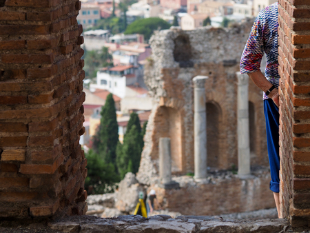 Taormina theatre with touristの写真素材