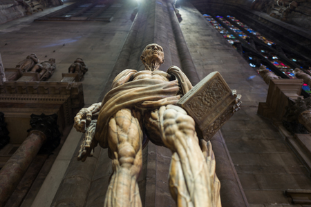 Milan, Italy - September 27: The famous Saint Bartholomew statue inside Milan Cathedral on September 27, 2017 in Milan, Italyのeditorial素材