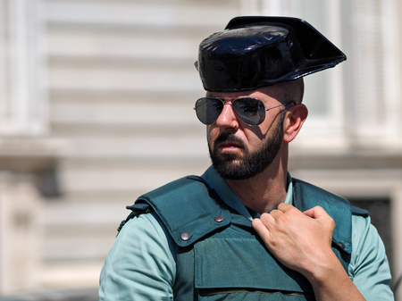 Madrid, Spain - June 06: Unidentified guaard stands in front of Royal Palace on June 06, 2015 in...