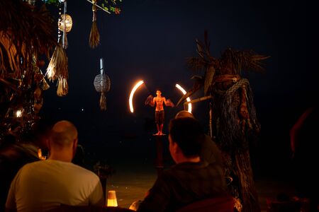 Koh Lipe, Thainald - February 19, 2019: A Fire-Eater performing at the beach of Koh Lipe.のeditorial素材