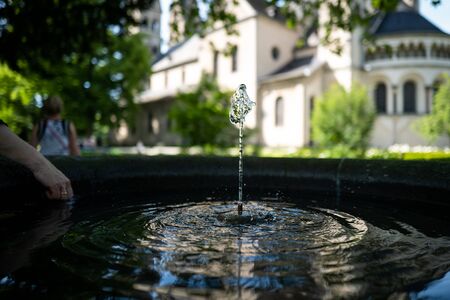 A fountain at Basilica St. Kastor in Koblenz, Germanyの写真素材