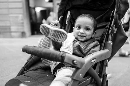 Pisa, Italy - September 26, 2020: A young boy smiling at the camera.