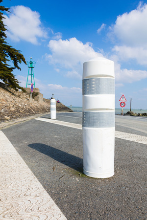 white flexible bollard with traffic zebraの写真素材