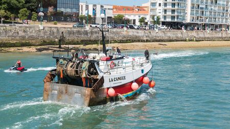 les Sables d Olonne, France - July 24, 2016 : a fishing boat returns to portのeditorial素材