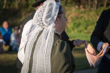 Brem sur Mer, France - July 09, 2016 : old women dance round in a show of traditional dance troupe Vendee region of France, celebrating a weddingのeditorial素材