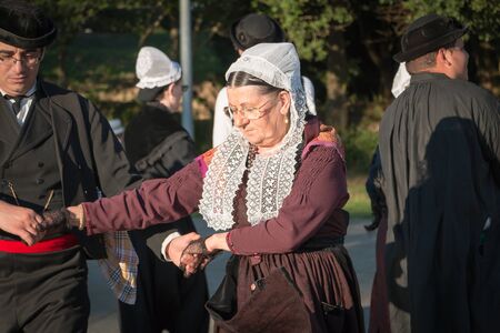 Brem sur Mer, France - July 09, 2016 : couples dancing in a show of traditional dance troupe Vendee region of France, celebrating a weddingのeditorial素材