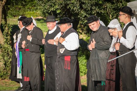 Brem sur Mer, France - July 09, 2016 : men dance in typical costume in a show of traditional dance troupe Vendee region of France, celebrating a weddingのeditorial素材