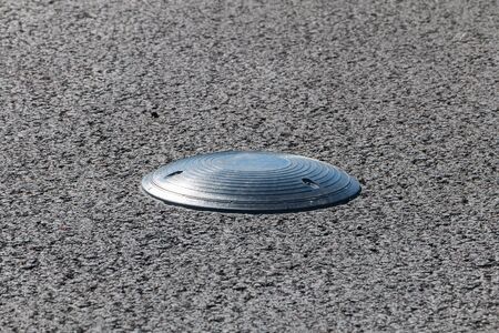 Electromagnetic car parking sensor to indicate where open parking is located on city streetsの写真素材