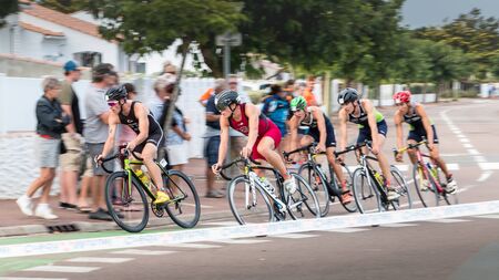 Saint Gilles Croix de Vie, France - September 10, 2016 : Final triathlon championship of France in the category D3 - frontrunners for a road bike raceのeditorial素材