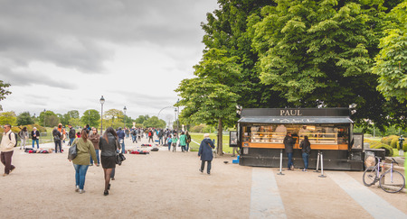 Paris, France - May 08, 2017 : In the garden of the Tuileries, in Paris, tourists buy food at Paul, a chain of shops very well known for their sandwitchのeditorial素材