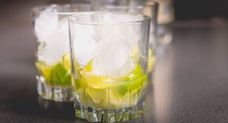 Brazilian caipirinha glass with icicle on black backgroundの写真素材