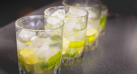 Brazilian caipirinha glass with icicle on black backgroundの写真素材