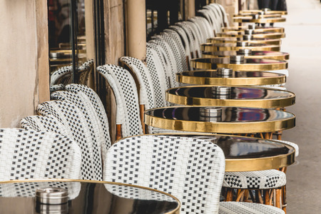 Traditional Parisian terrace with tables, chairs and ashtraysの写真素材