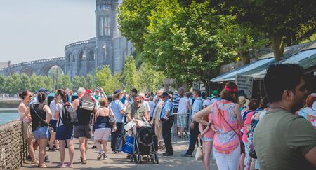 Lourdes, FRANCE, June 22, 2017 - pilgrims heading towards the miraculous water pools of Lourdes, Franceのeditorial素材